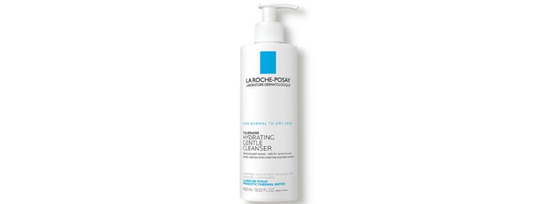 a white and blue 400-ml pump bottle of the La Roche-Posay Toleriane Hydrating Gentle Facial Cleanser. On the bottle, it says: LA ROCHE-POSAY LABORATOIRE DERMATOLOGIQUE, FOR NORMAL TO DRY SKIN, TOLERIANE HYDRATING GENTLE CLEANSER, Dermatologist tested - safe for sensitive skin, Gently cleanses while retaining essential moisture, SOAP FREE - SULFATE FREE - FRAGRANCE FREE, CERAMIDE-3 + NIACINAMIDE, LA ROCHE-POSAY PREBIOTIC THERMAL WATER