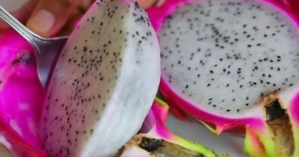 Cut dragon fruit Into Two Pieces