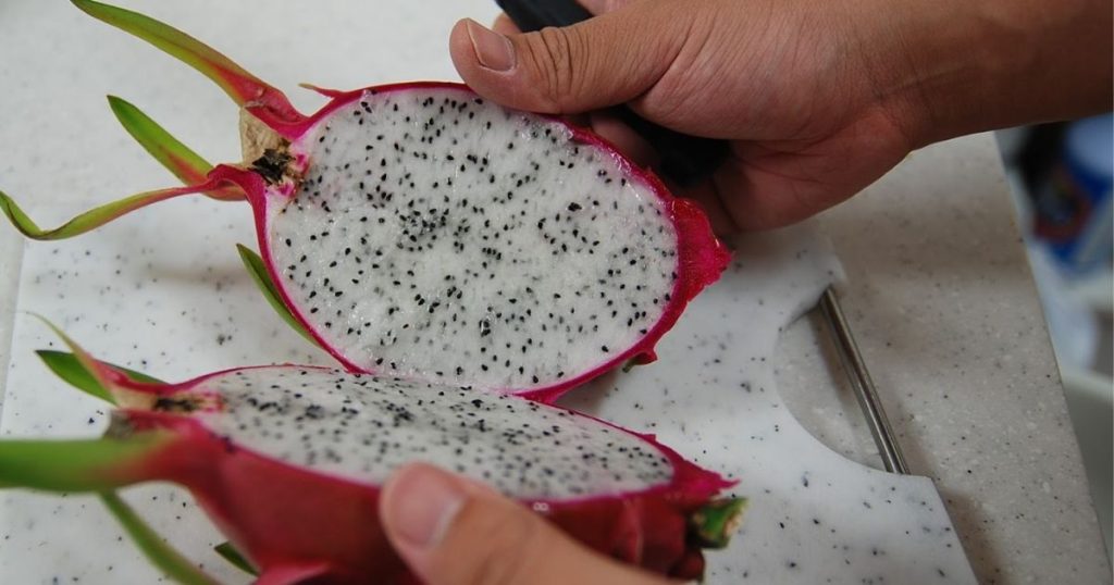 Cut dragon fruit Into Two Pieces