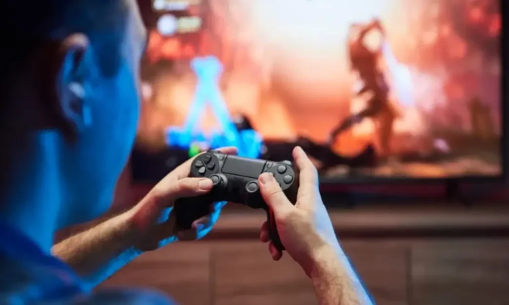 A man playing video games to kill your boredom
